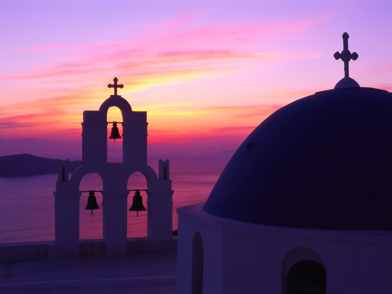 Church and bell tower at sunset, santorini, cyclades, greece